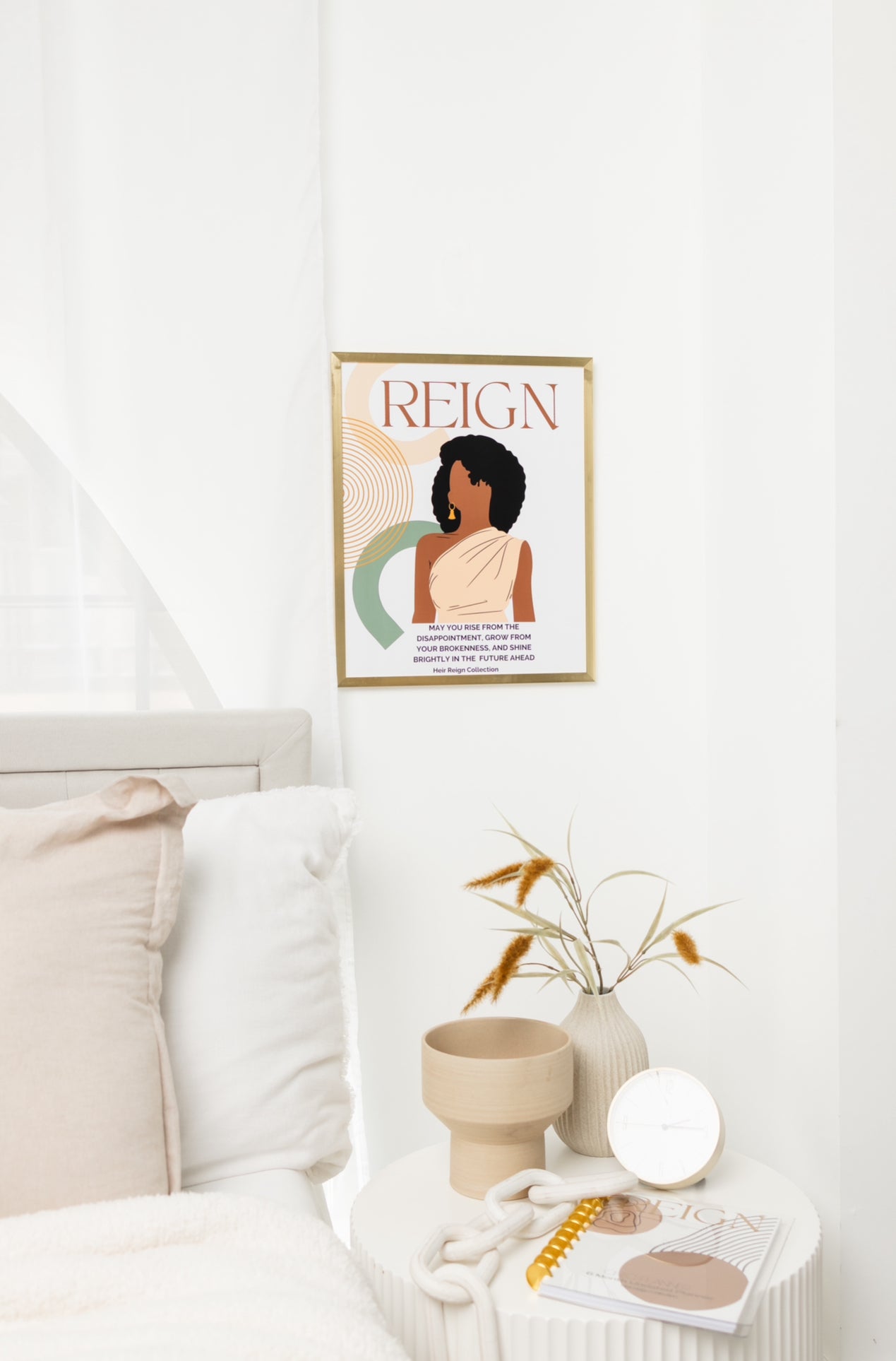 Beautiful wall art illustration of a black woman with an afro hair style with a soft pink top and inspirational positive affirmation. The picture is in a gold frame with beautiful home decor.