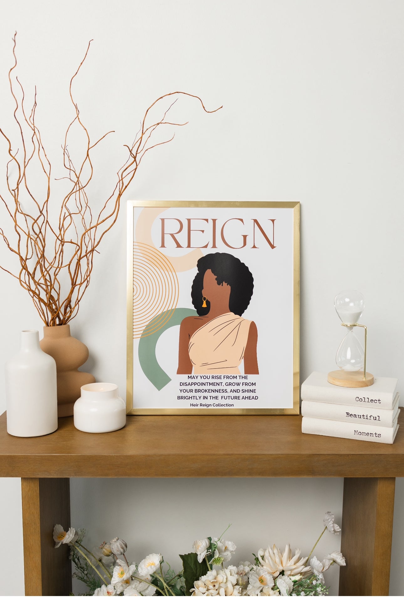 Beautiful wall art illustration of a black woman with an afro hair style with a soft pink top and inspirational positive affirmation. The picture is in a  gold frame with beautiful home decor. 